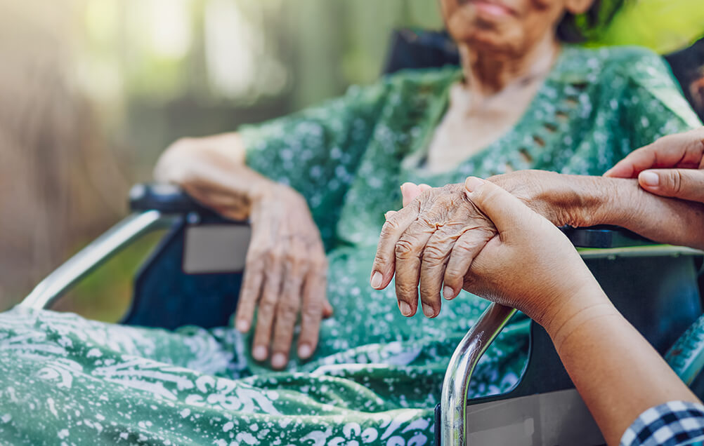 older ethnic woman in wheelchair